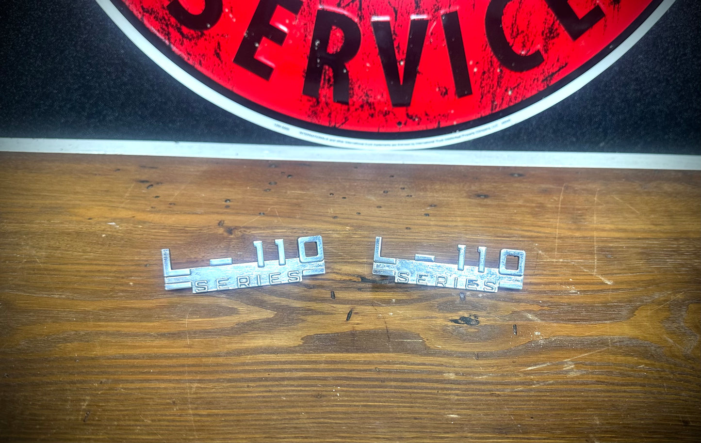 OEM IH L110 Emblems - Pair - Excellent Condition - SFJJ2T0241